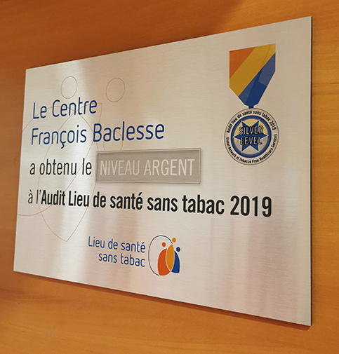 Plaque "Le Centre Baclesse obtient le Niveau Argent à l'Audit Lieu de santé sans tabac 2019"