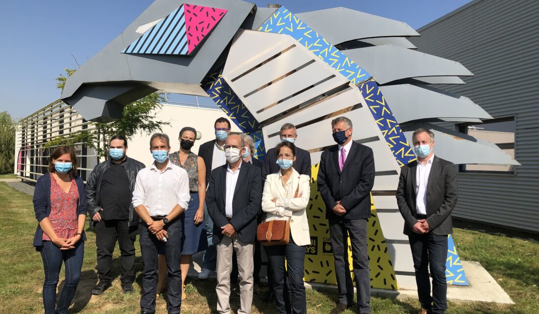 LABEO and Baclesse staff pose in front of the LABEO building