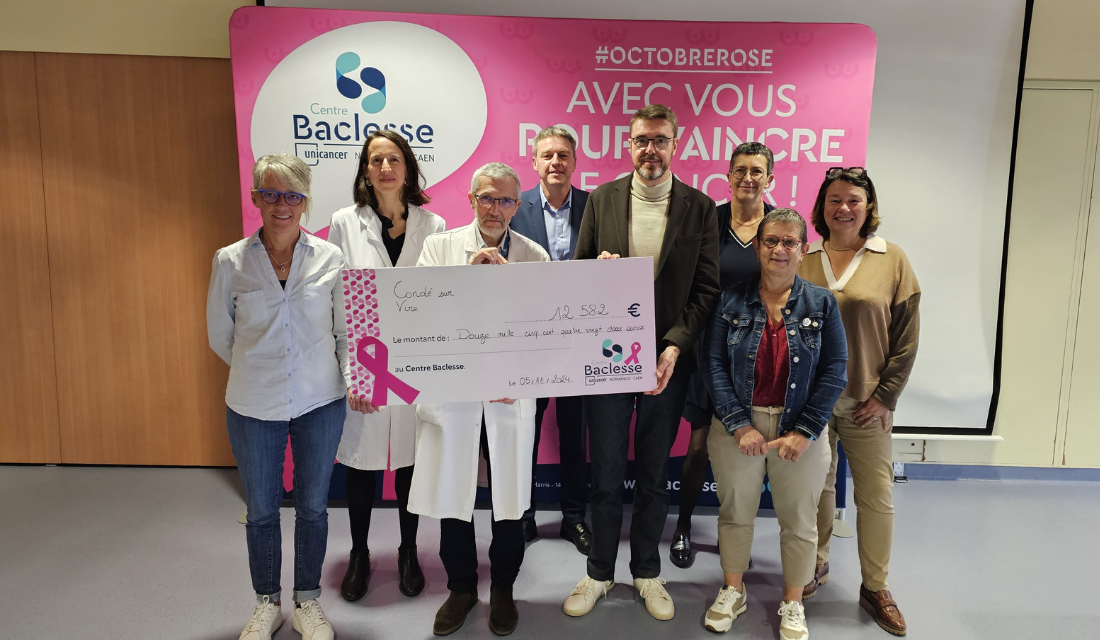 Remise de chèque par la mairie de condé sur vire, Savencia et Elvir au Centre Baclesse de Caen
